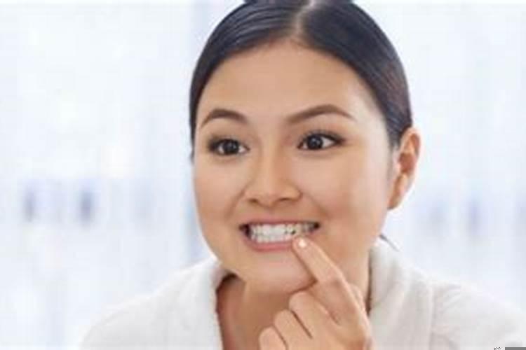 梦见牙掉了是什么征兆掉了一小块