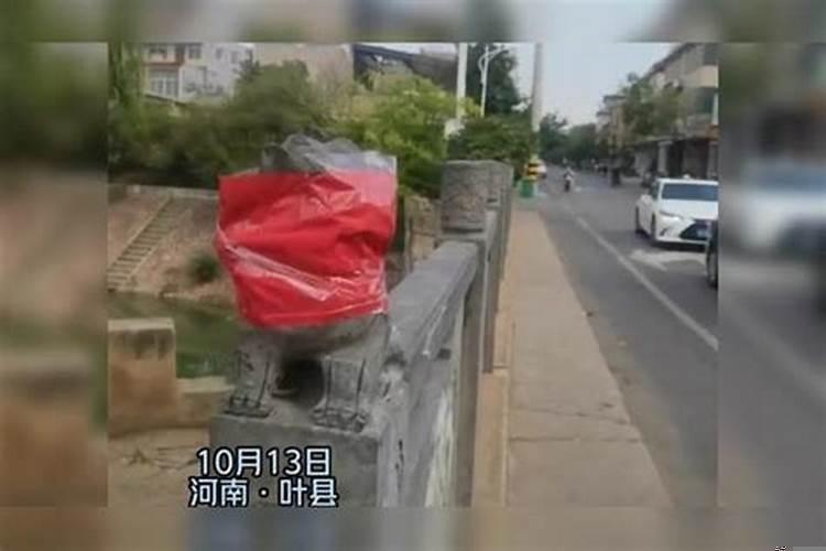 石狮用红布蒙住眼睛