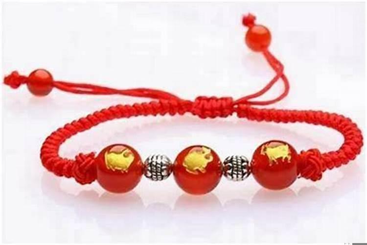 本命年红绳洗澡可以摘吗